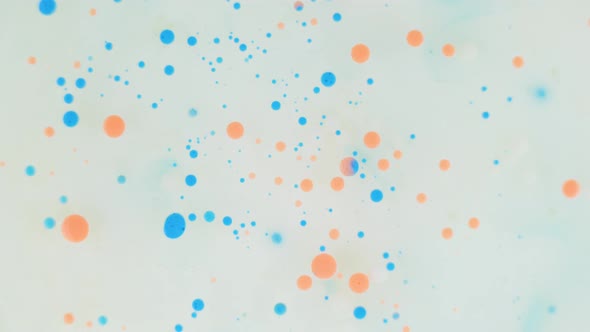 Orange and Blue Ink Bubbles Background Texture Cosmetic Rotating