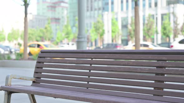 Indian Woman Coming and Sitting on Bench Outdoor