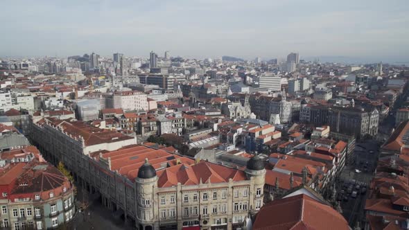 Aerial view of Porto old town rooftops on a cloudy day, sideways shot