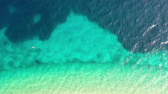 Aerial view on the beach. Vacation and adventure. Beach and blue water