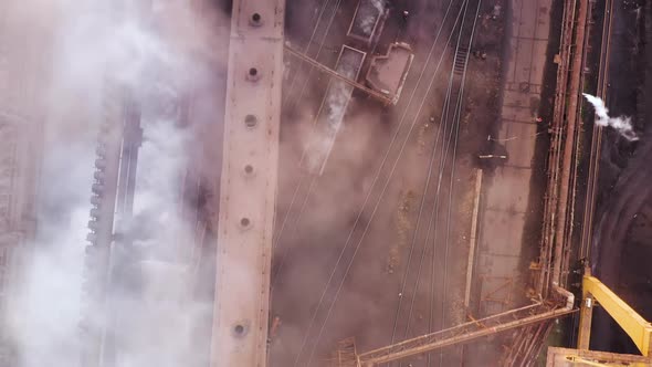 Aerial View Over Industrialized City with Air Atmosphere. Dirty Smoke and Smog From Pipes of Steel