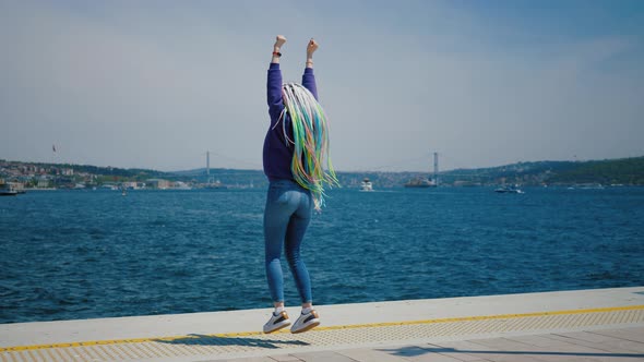 Young Hipster Girl Walking Along Embankment Against Bosphorus Turkey Galataport