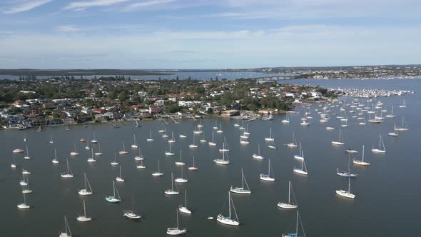 Stunning drone aerial shot over the Sydney Marina at San Souci, moving closer to the waterfront resi