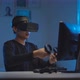 Asian young man playing video game in virtual reality headset - VideoHive Item for Sale