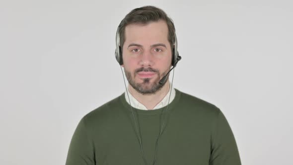 Portrait of Man with Head Set Looking at Camera White Screen