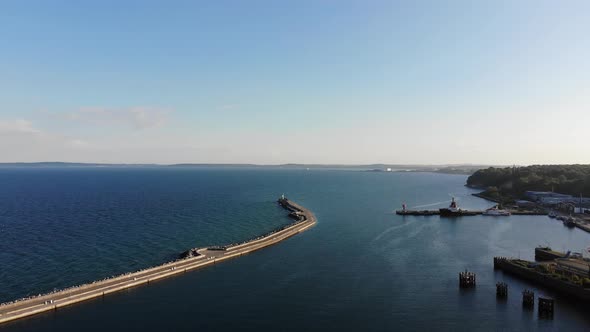 Flight over the sea to the lighthouse.