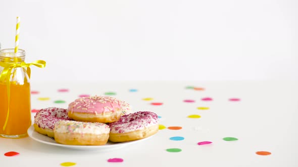 Donuts and Lemonade or Juice in Glass Bottles