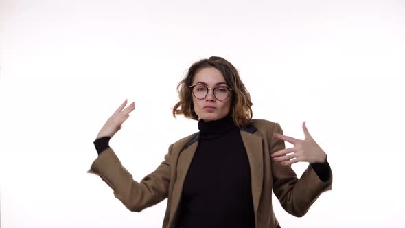 Portrait of Girl with Curly Hair in Stylish Glasses She Dancing Comically with Delight