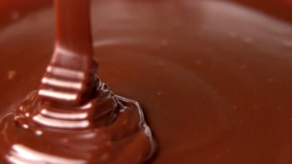 Pouring Hot Dark Chocolate. Pouring Melted Liquid Premium Dark Chocolate