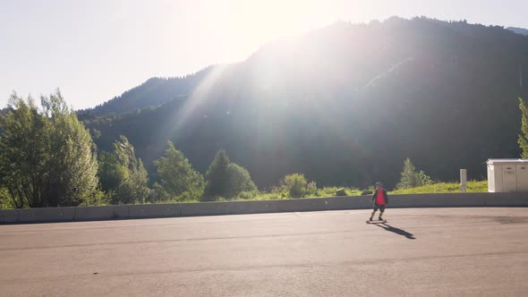 Skatebording at Longboard in the Mountain Road