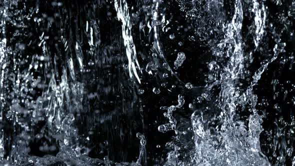 Super Slow Motion Shot of Water Splash Isolated on Black Background at 1000Fps