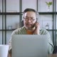 asian male dad using laptop and conversation on smartphone remotely distance working - VideoHive Item for Sale