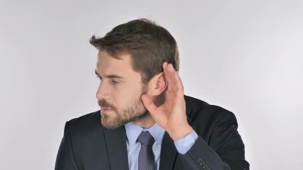 Handsome Businessman Listening Secret, White Background