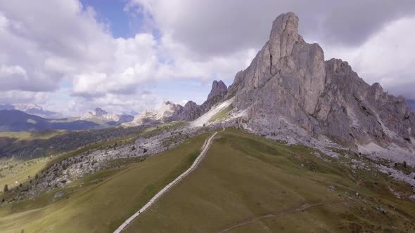 Aerial Flight Above Mountain Top in Sunny Day