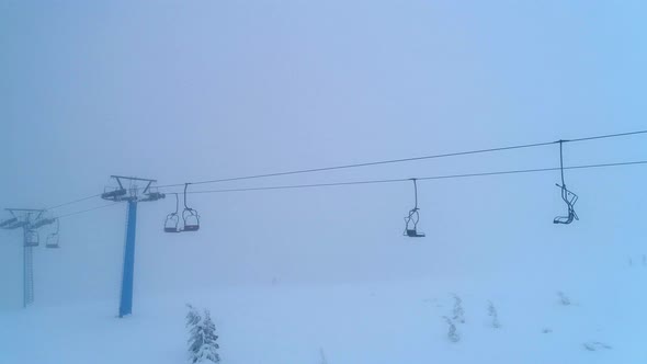 Fly over mobile base station near ski lift