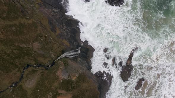 Aerial View of the Beautiful Waterfall at the Coast at Malin Beg Looking in County Donegal, Ireland