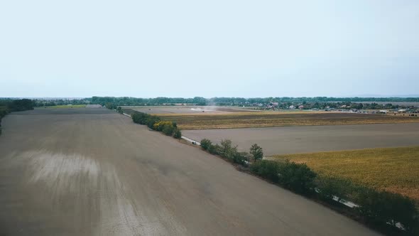 Drone shot of a field during harvest