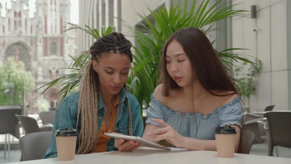 High School Female Students Studying with Digital Tablet