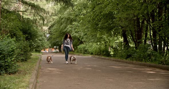 Pretty Woman and Her Happy Doggies Together