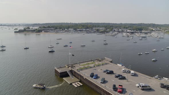 Aerial Tilt Up and Pan Around of Boats at Manhasset Bay Long Island