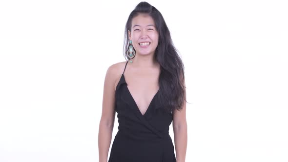 Happy Beautiful Asian Woman Smiling Ready To Party