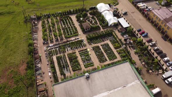 aerial view of garden shop. working people. potted plants