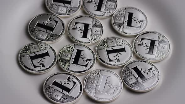 Rotating shot of Litecoin Bitcoins (digital cryptocurrency) - BITCOIN LITECOIN 0114