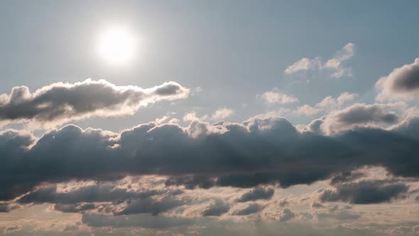 Sunset in the Sky Through Layered Clouds Timelapse