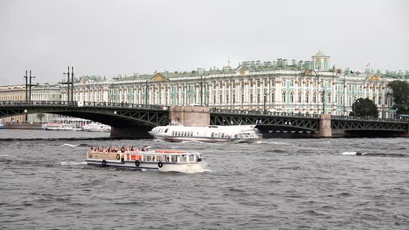 Boats and ships on the Neva River in St. Petersburg in the summer