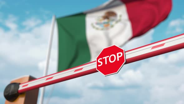 Opening Boom Barrier with Stop Sign Against the Mexican Flag