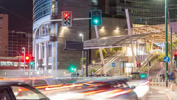 Traffic in Milan Near Modern Skyscrapers in Porta Nuova Business District Night Timelapse in Milan