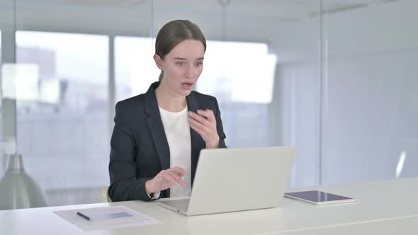 Hardworking Young Businesswoman Having Failure on Laptop 