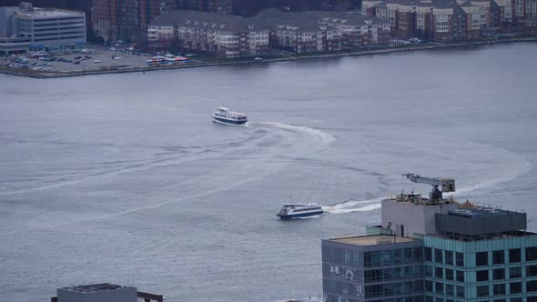 boats moving on Hudson river from above during windy day in new york