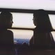 Two girls talking and connecting on the balcony - VideoHive Item for Sale