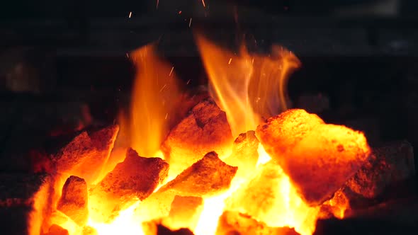 Incandescent Coals Are Being Poked in Slow Motion