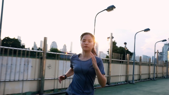 Jogging workout lifestyle on the street at sunset.