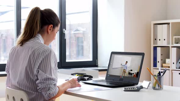 Woman with Laptop Having Video Call at Office