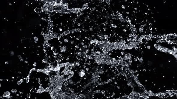 Super Slow Motion Shot of Abstract Water Splash Isolated on Black Background at 1000Fps