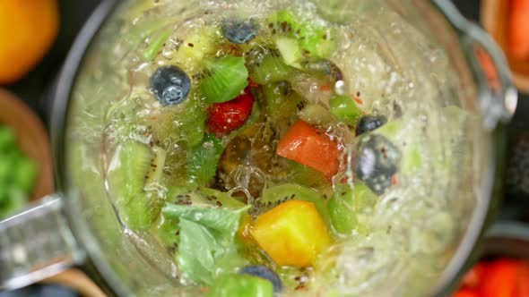 Super Slow Motion Shot of Blending Fresh Fruit Smoothie at 1000 Fps alt