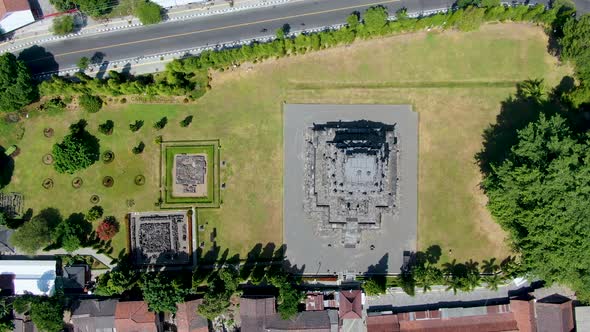 Ancient Mendut temple in Buddhist monastery on Java, Indonesia, aerial top down