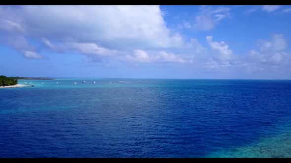 Aerial top view sky of perfect seashore beach adventure by turquoise ocean and bright sandy backgrou