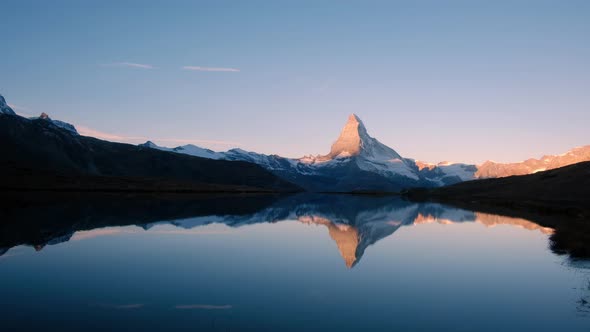 Picturesque View of Matterhorn Peak and Stellisee Lake in Swiss Alps