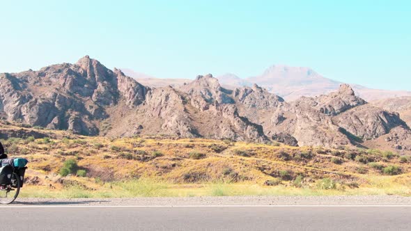 Traveller On Bicycle Stop For Photo