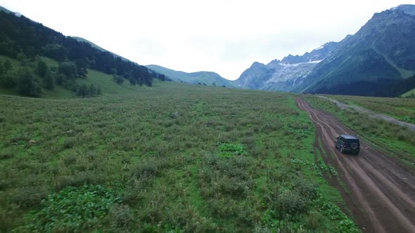 Suv Rides On A Mountain Road 8