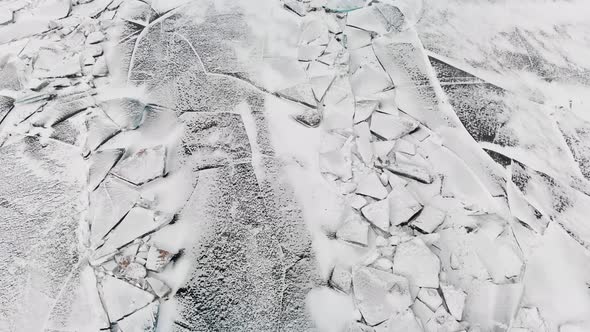 Aerial View Ice Hummock and Cracks at Frozen Lake