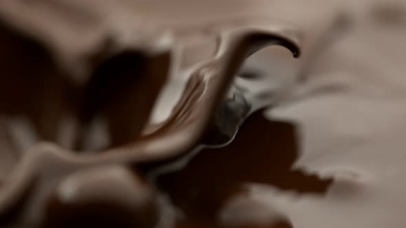 Super Slow Motion Shot of Waving Melted Milk Chocolate at 1000 Fps