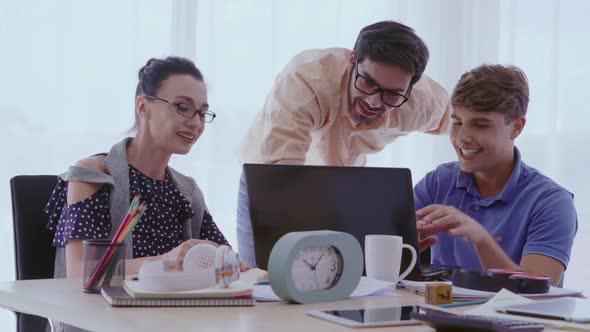 Group Meeting of Creative Business People Designer and Artist at Office Desk