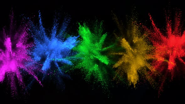 Super Slowmotion Shot of Color Powder Explosions Isolated on Black Background alt