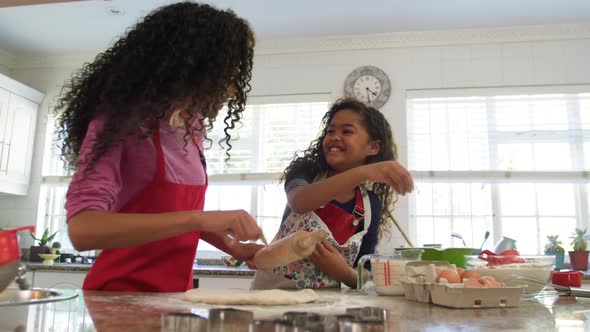 Family making Christmas cookies at home