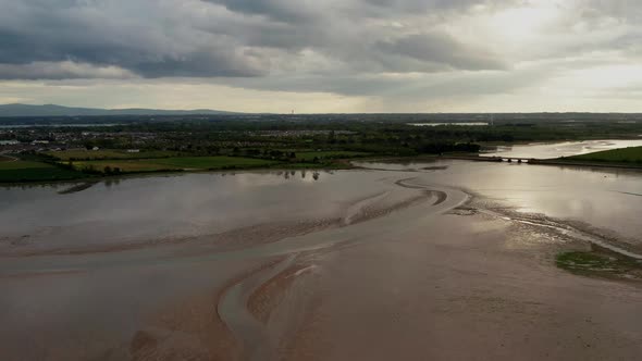 Estuary at sunset, aerial view.